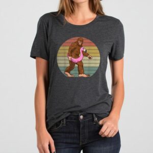 Maroutee Sasquatch Bigfoot Carrying Flamingo T-Shirt